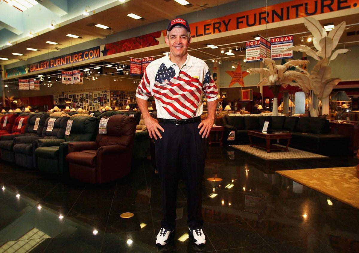 Jim McIngvale, a.k.a. "Mattress Mack," poses in his Houston furniture store on April 25, 2003.