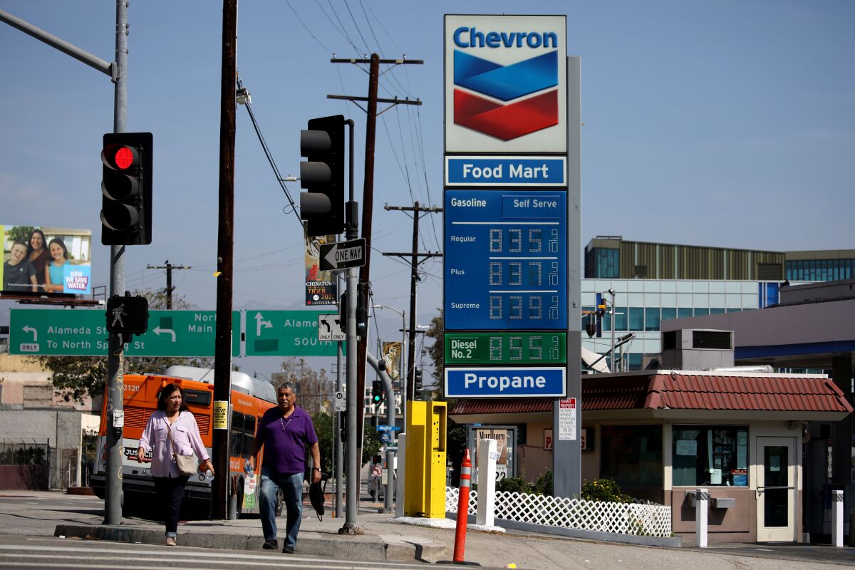 A Chevron gas station in downtown Los Angeles posts prices above $8 per gallon.