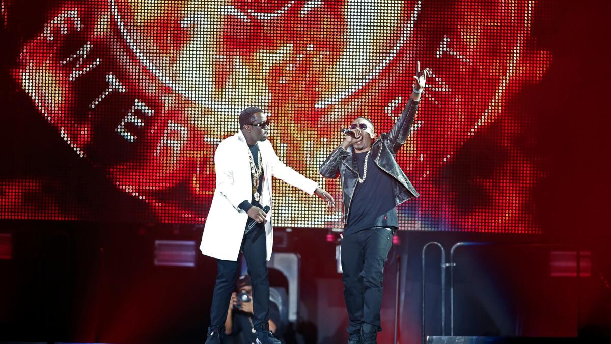 Nas, right, joined Puff Daddy for "Hate Me Now."