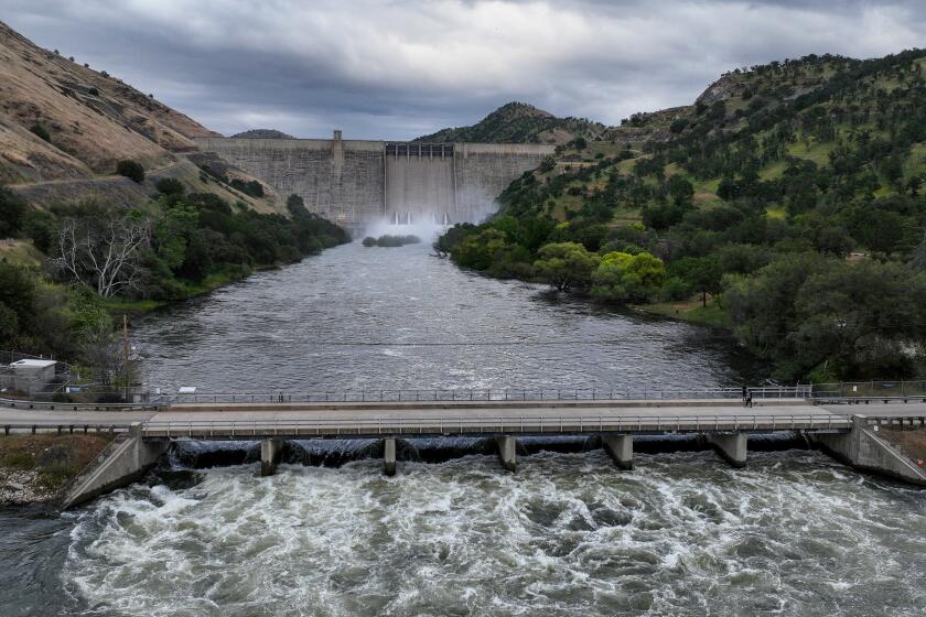 Pine Flat, CA, Tuesday, May 2, 2023 - Water rushes out of Pine Flat Dam as the Army Corps of Engineers continue to manage flows into the King's River weeks before the record Sierra snowpack melts. (Robert Gauthier/Los Angeles Times)