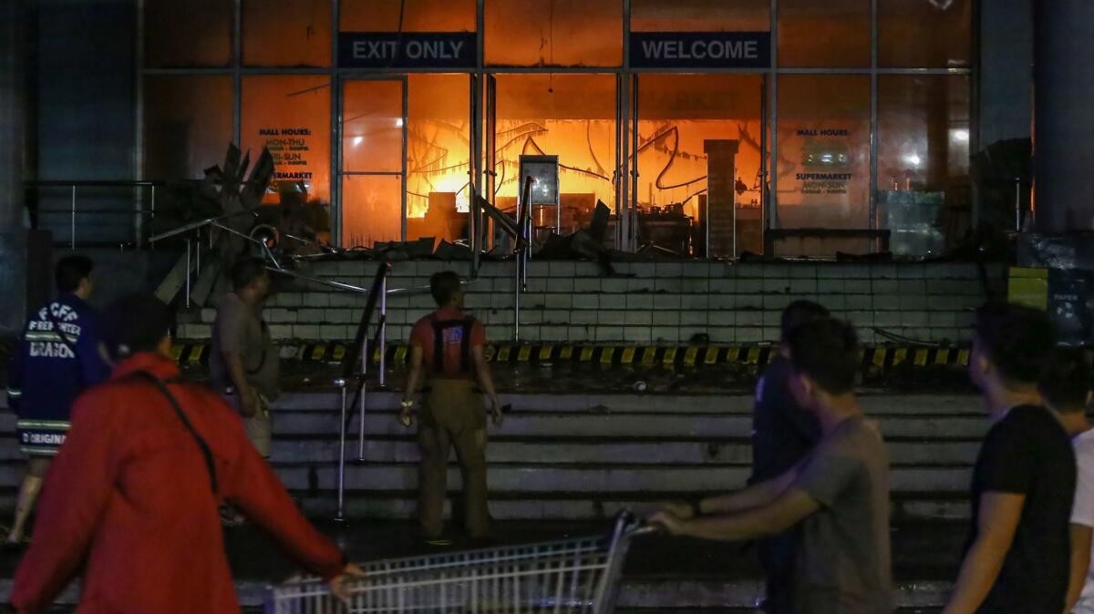 One body has been recovered and 36 people are feared dead from a fire at a four-story shopping mall in the southern Philippine city of Davao.