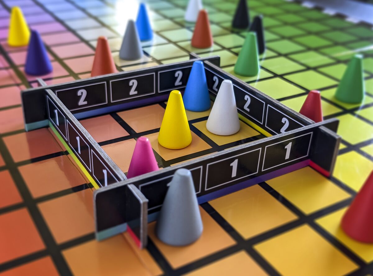 This image provided by The Op shows the Hues and Cues board game by The Op. The game has grown in popularity during the pandemic due to TikTok. (The Op via AP)