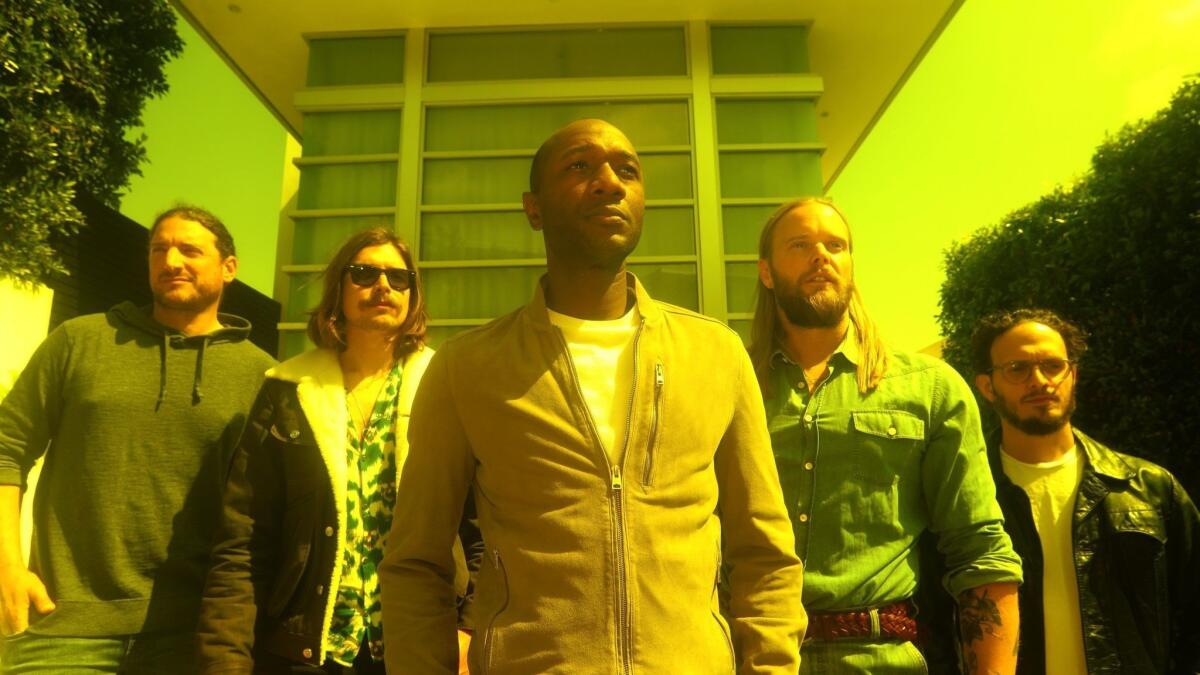 From left: Geffen Records president Neil Jacobson, singer-songwriter and producer Joe Janiak, singer Aloe Blacc, and producing team Vincent Pontare and Salem Al Fakir, in front of the home where Avicii once lived and worked in Los Angeles.