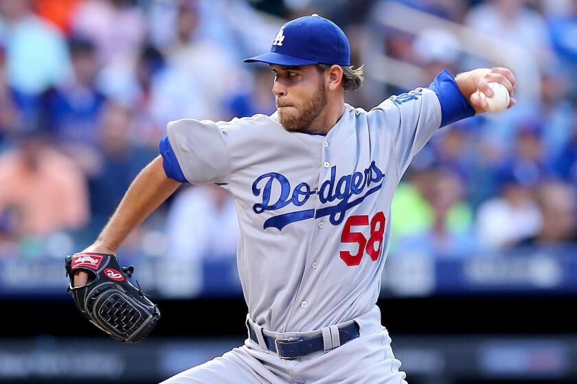 Dodgers pitcher Ian Thomas delivers a pitch during the first inning of a 7-2 win over the New York Mets on Friday.