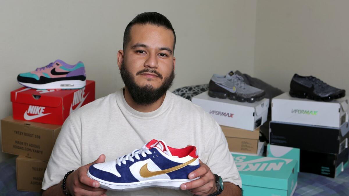 Johan Aguirre, a sneaker collector and successful trader, shows some of his inventory. He plays StockX, the sneaker reseller platform, like it's the stock market.