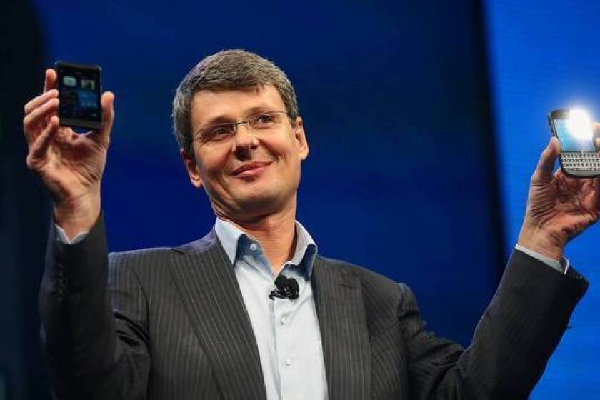 BlackBerry Chief Executive Thorsten Heins displays the BlackBerry 10 smartphone at an event in New York in January. BlackBerry has signed a letter of intent to be bought by a consortium led by Fairfax Financial Holdings Limited.