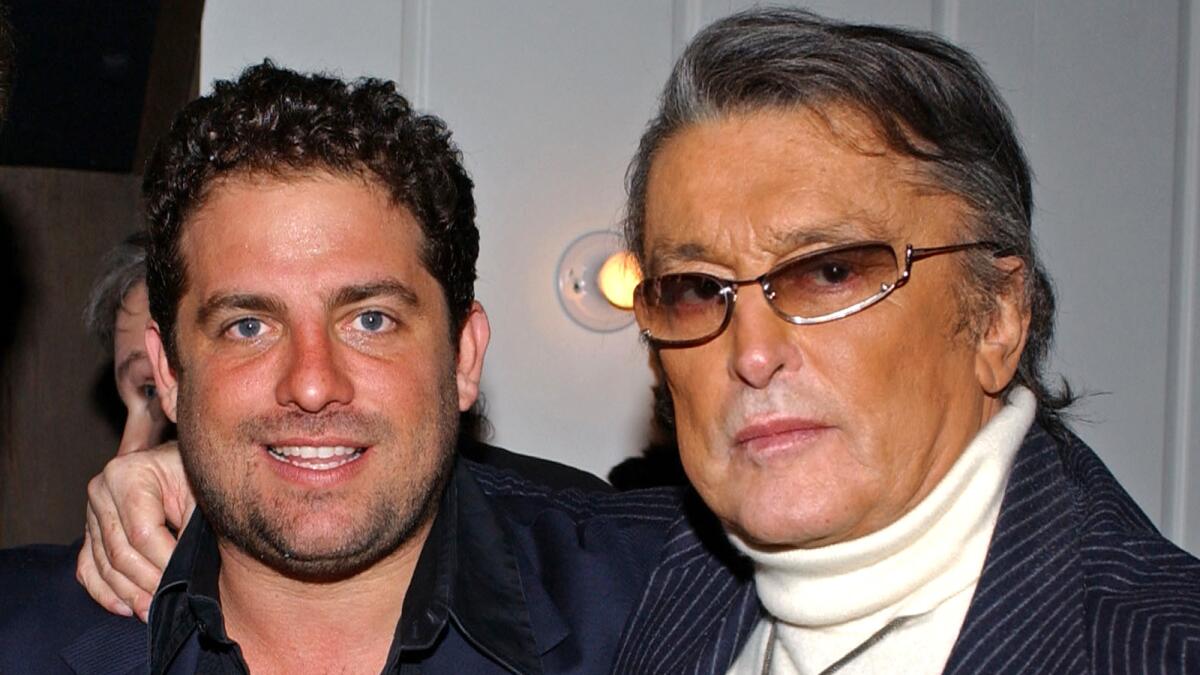 Director Brett Ratner and producer Robert Evans stand for a photo at a Beverly Hills Oscars party in 2005.