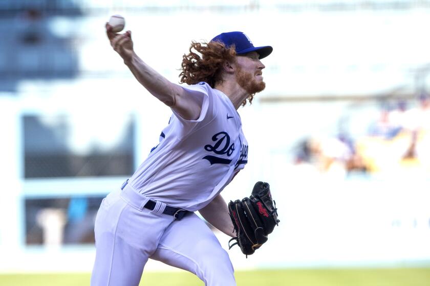 Los Angeles Dodgers starting pitcher Dustin May throws to a Miami Marlins batter during the first inning of a baseball game in Los Angeles, Saturday, Aug. 20, 2022. (AP Photo/Alex Gallardo)