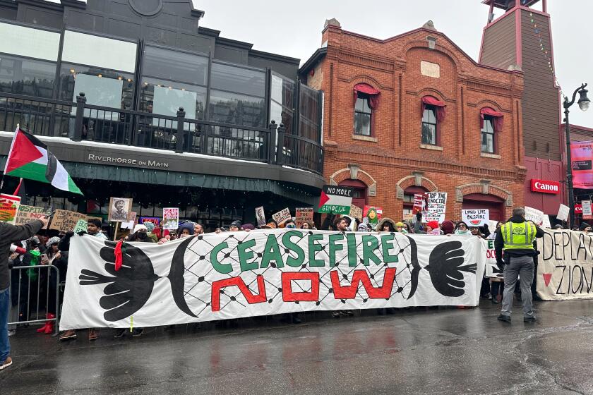 Pro-Palestinian protesters on Main Street in Park City, Utah during the Sundance Film Festival on Sunday, Jan. 21, 2024.