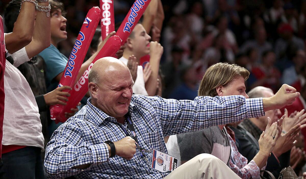 Owner Steve Ballmer celebrates as the Clippers hold on for a 93-90 victory over the Thunder.