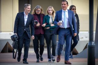 VAN NUYS, CA - FEBRUARY 14: Rebecca Grossman, second from left, with her husband, Dr. Peter Grossman, left, and daughter heads to Van Nuys Courthouse West Van Nuys, CA. (Irfan Khan / Los Angeles Times)
