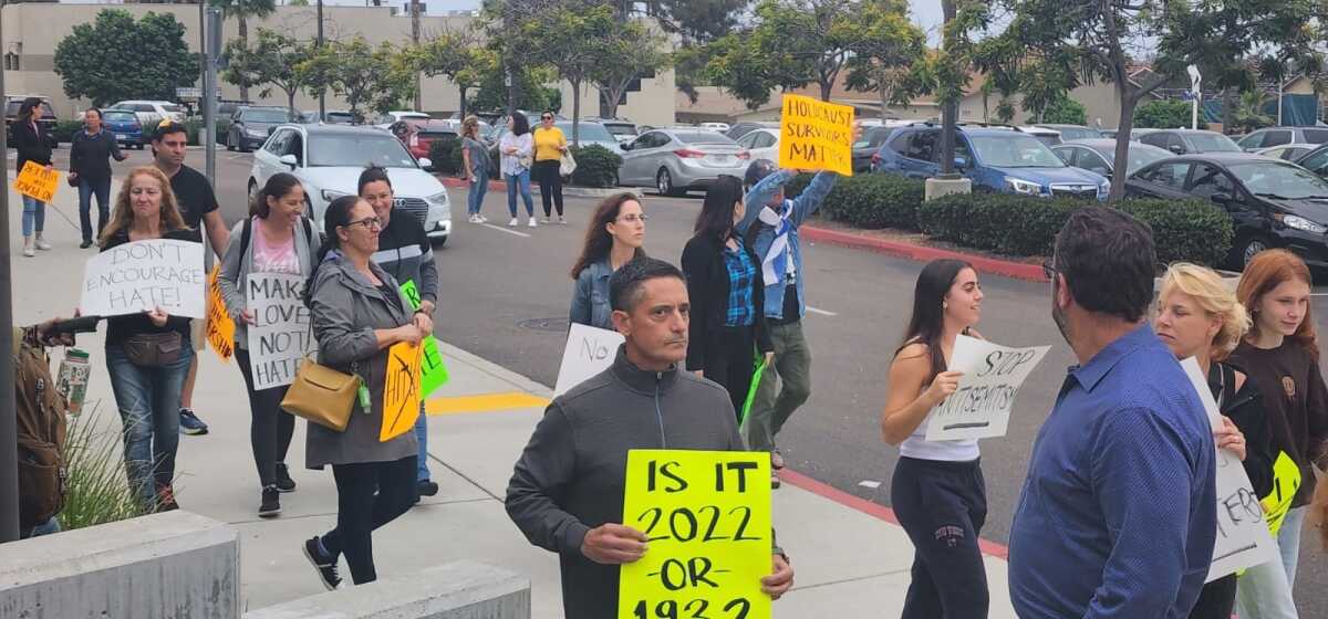 The community rallied before the SDUHSD meeting at San Dieguito Academy.