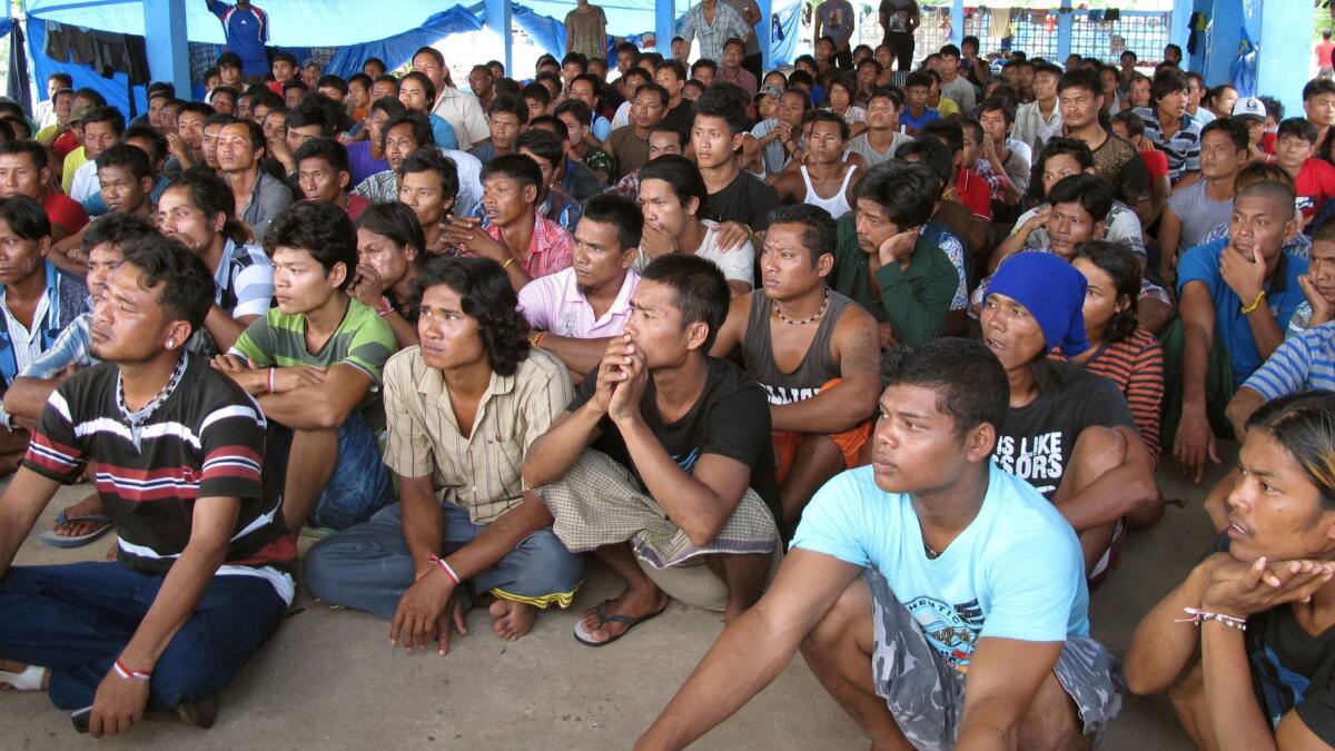 Former fishing slaves who were rescued by the Indonesian government from the remote island of Benjina. Indonesia in 2016. (Margie Mason / Associated Press)