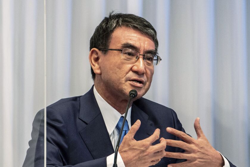 FILE - Japan's Digital Agency Minister Taro Kono is seen on Sept. 20, 2021. The Digital Agency was set up in Japan 2021 to nurture competitiveness in digital technology. (Philip Fong/Pool Photo via AP, File)