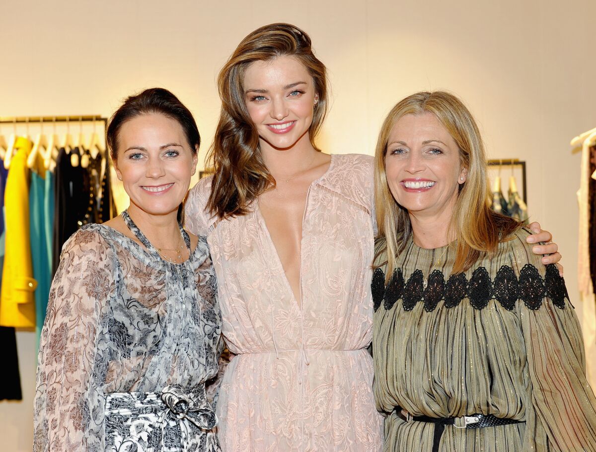 From left, Nicky Zimmermann, model Miranda Kerr and Simone Zimmermann attend the opening of the Zimmermann Melrose Place flagship store in West Hollywood.