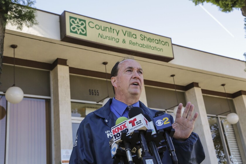 Los Angeles Police Lt. Paul Vernon addresses the media in front of Country Villa Sheraton Nursing and Rehabilitation home in North Hills, where a man allegedly killed his 58-year-old sister as she lay in a vegetative state.