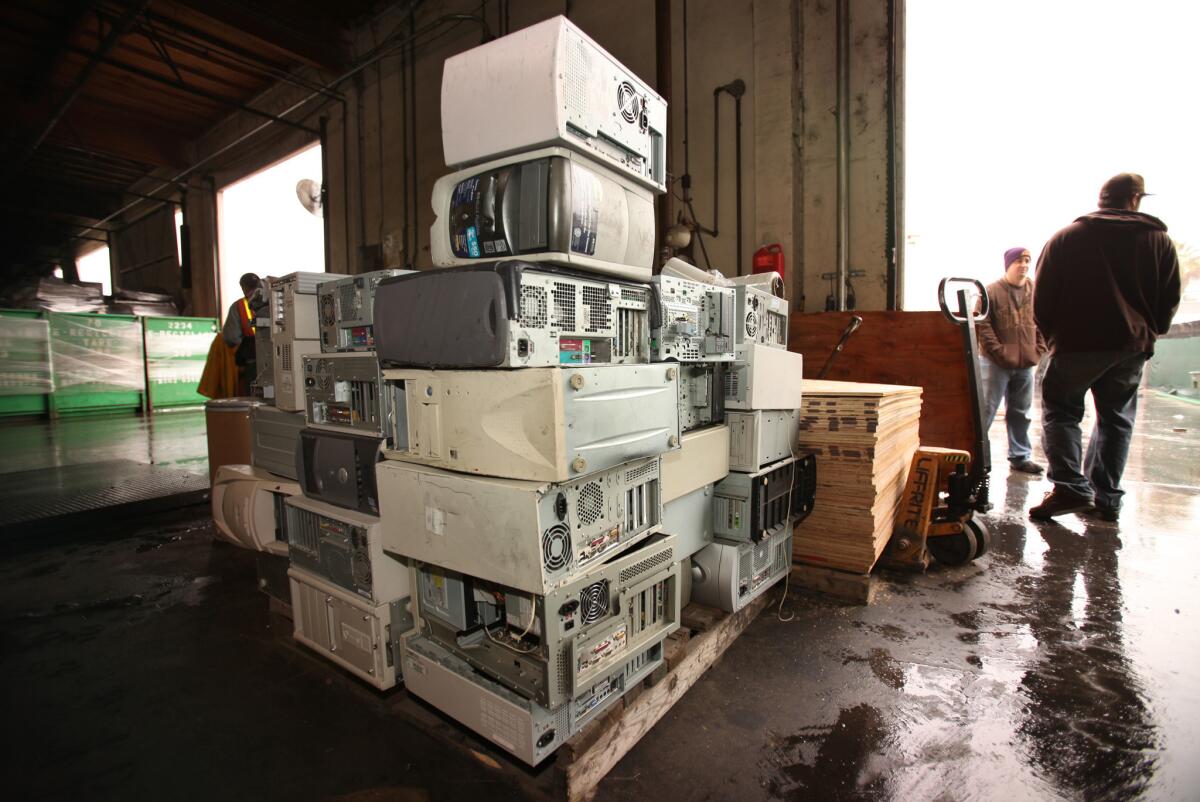 Old computers and other electronics must be taken to a specialty recycling center, such as this one in Paramount, where items are disassembled.