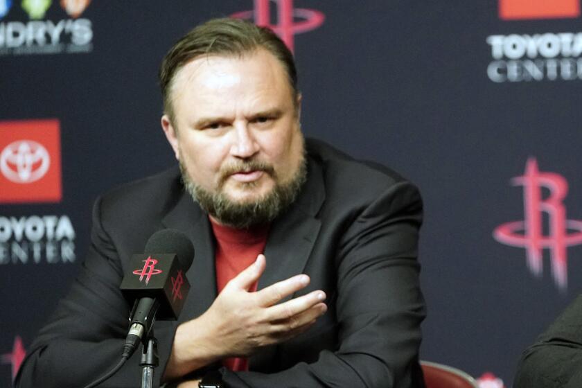 FILE - This is a July 26, 2019, file photo showing Houston Rockets General Manager Daryl Morey during an NBA basketball news conference in Houston. The Philadelphia 76ers officially named Daryl Morey president of basketball operations and extended the contract of general manager Elton Brand on Monday, Nov. 2, 2020. Morey stepped down as GM of the Houston Rockets earlier this month after blockbuster moves that failed to lead the franchise to the NBA Finals. (AP Photo/David J. Phillip, File)