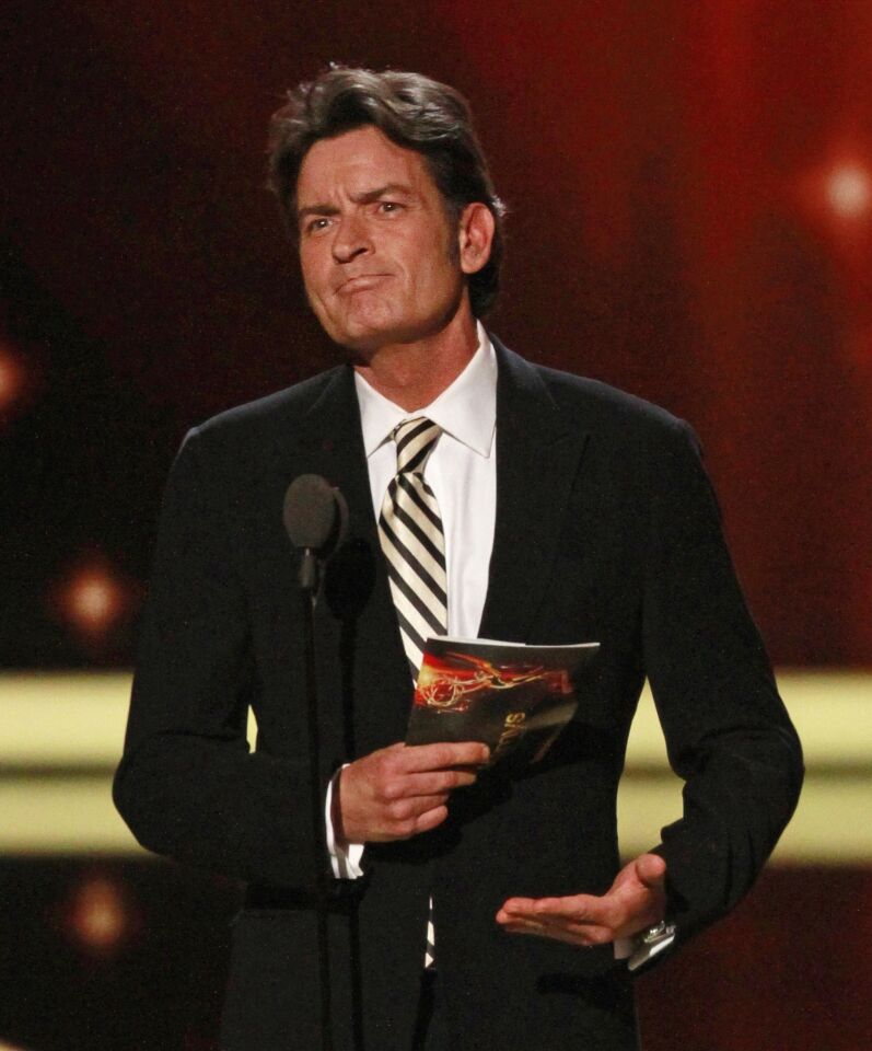 After weeks of "winning" in a media frenzy following his firing from "Two and a Half Men," Charlie Sheen publicly apologized for his "warlock" ways -- which included lashing out at the sitcom's creator Chuck Lorre and costar Jon Cryer; alleged substance abuse; shacking up with a pair of "goddesses"; launching a tour called "My Violent Torpedo of Truth/Defeat Is Not An Option" and a slew of questionable statements that suggested a meltdown. During the 2011 Emmy Awards, Sheen made an effort to mend his fences with his former colleagues Lorre and Cryer. "From the bottom of my heart, I wish you nothing but the best for this upcoming season," Sheen said before presenting an award. Sheen also talked about his "manic period" with Matt Lauer on the "Today Show," saying he was "a lot calmer and a lot mellower." He also made an appearance on the "Tonight Show with Jay Leno." "[The media frenzy] was like a runaway train that I was kind of the reluctant conductor of and it just kept going," he said.