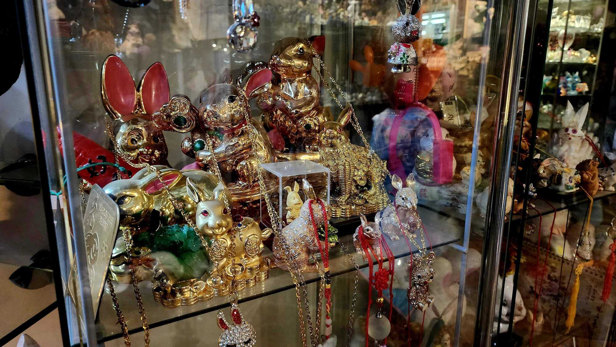 A display case full of ornate rabbits 