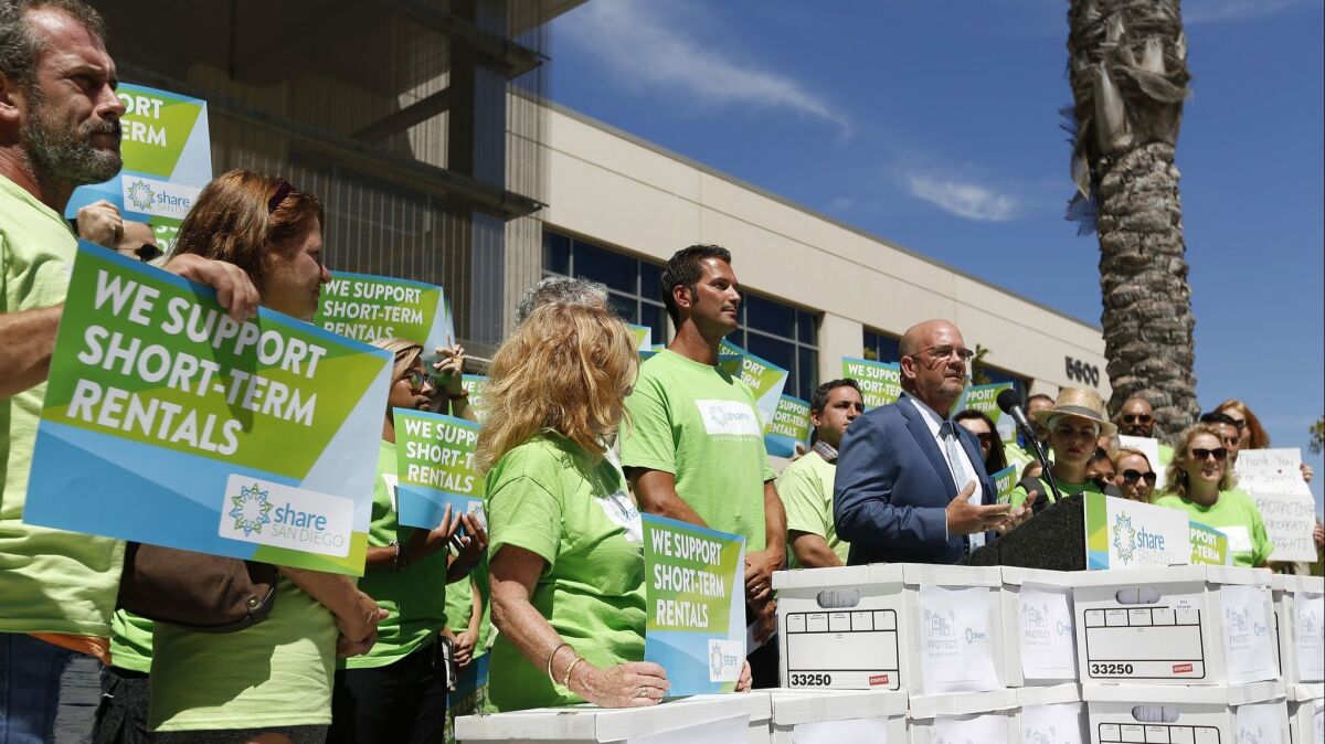 San Diego City Councilman Scott Sherman speaks at a news conference before signatures were delivered to the San Diego Registrar of Voters to qualify a referendum seeking to overturn new short-term rental regulations.