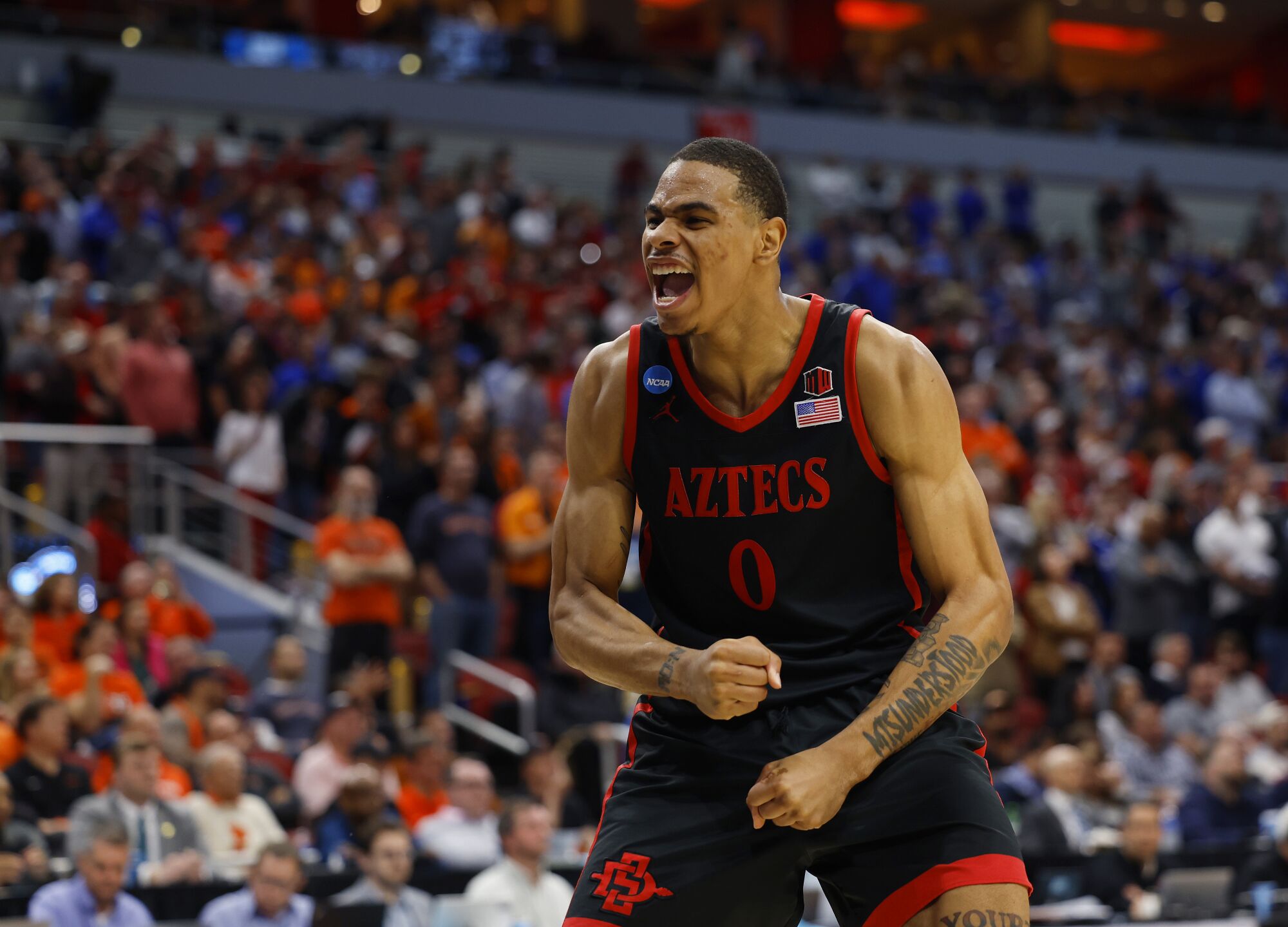 San Diego State's Keshad Johnson celebrates during a win against Alabama in a Sweet 16 game.