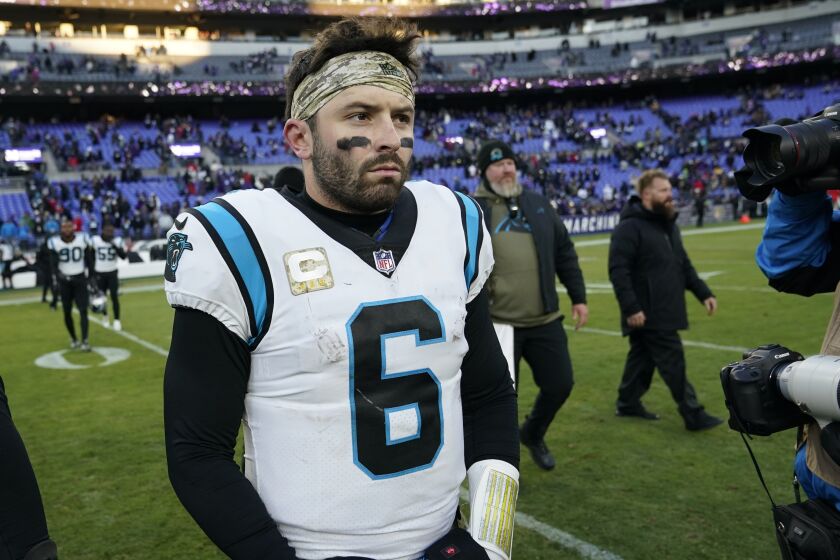 FILE - Carolina Panthers quarterback Baker Mayfield (6) walks off the field after his teams loss to the Baltimore Ravens 