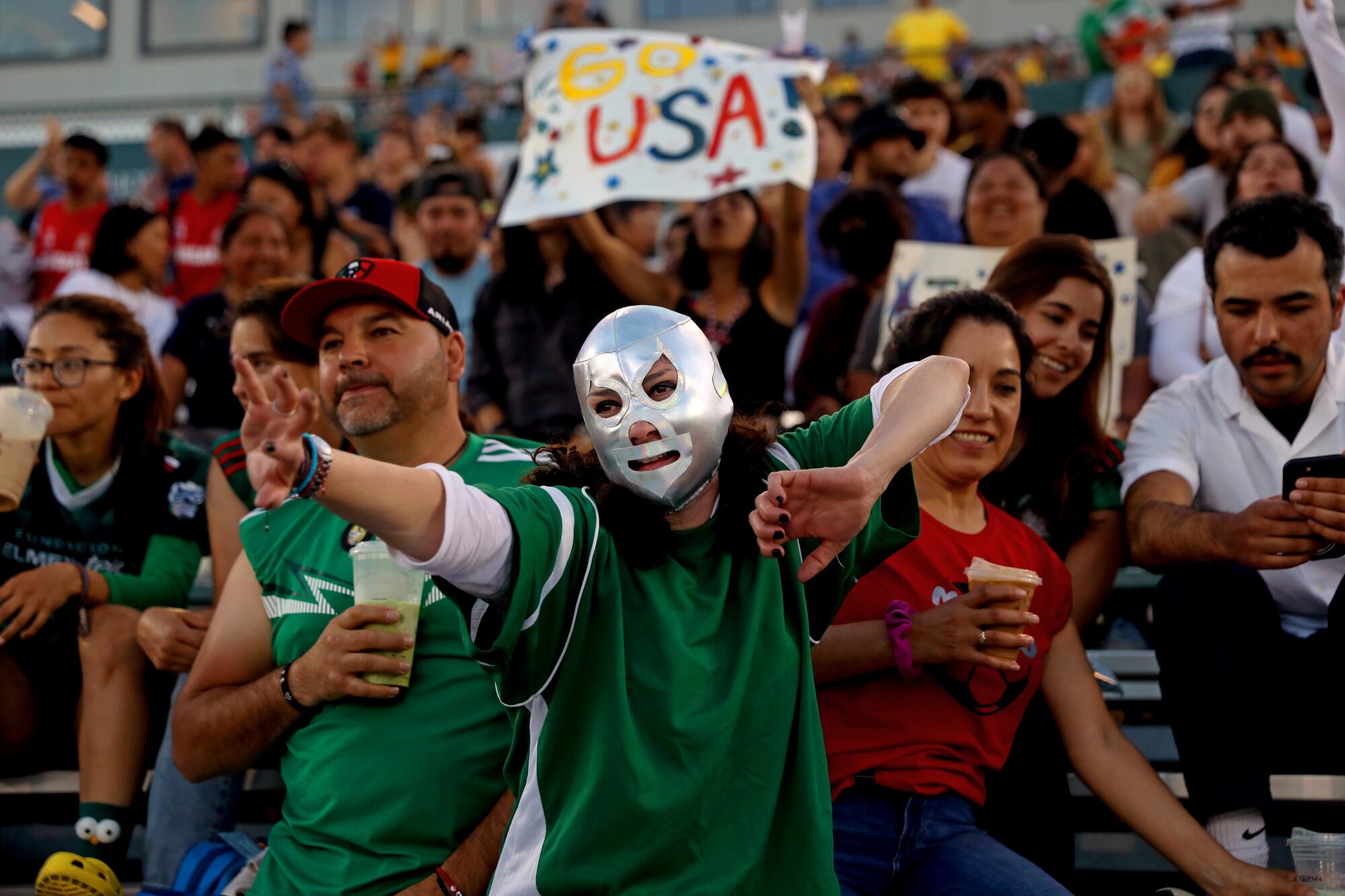 Olivia Flores wears a mask in support of Team Mexico at the Homeless World Cup.