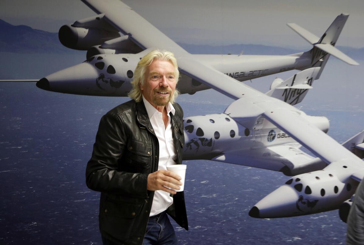 Richard Branson is seen at the Virgin Galactic hangar at Mojave Air and Space Port in Mojave this year. NBC says it will air a competition show with an out-of-this-world prize: a ride into space.