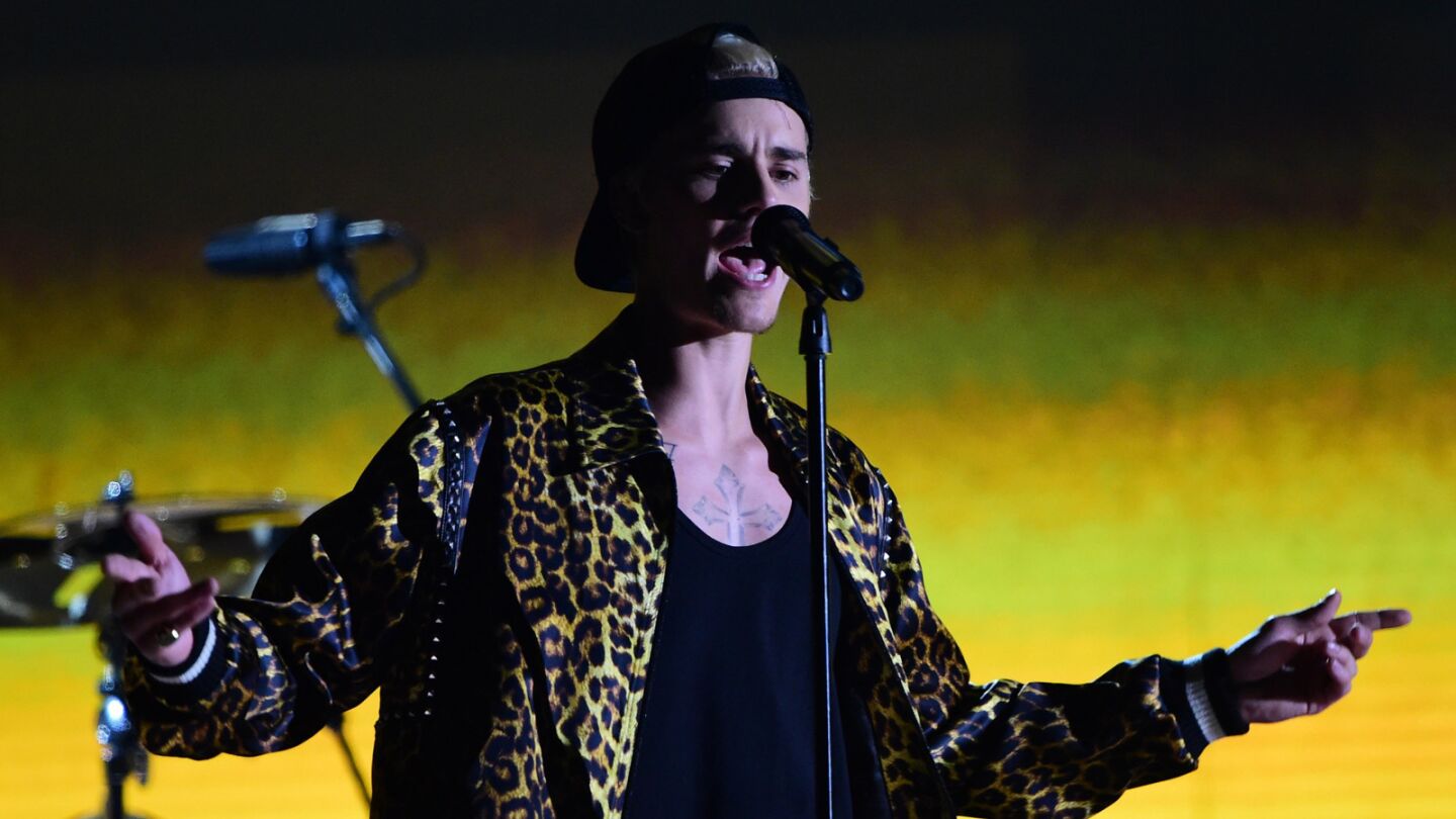 Justin Bieber performs "Love Yourself" and "Where Are U Now" onstage with Jack U.