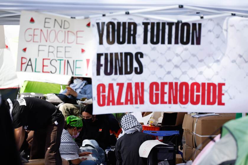 San Diego, CA - May 03: Pro-Palestinian students and supporters gather inside an encampment at UCSD on Friday, May 3, 2024 in San Diego, CA. (Meg McLaughlin / The San Diego Union-Tribune)