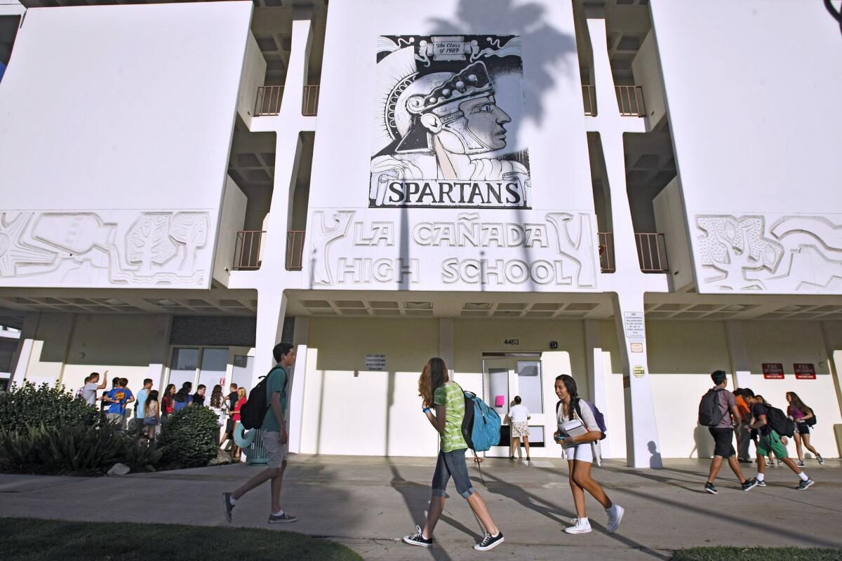 A volunteer of Unite LCF! writes this week to remind her neighbors in the westernmost section of the city that they have until April 22 to apply to attend LCUSD campuses. Above, students arrive on campus at La Cañada High.