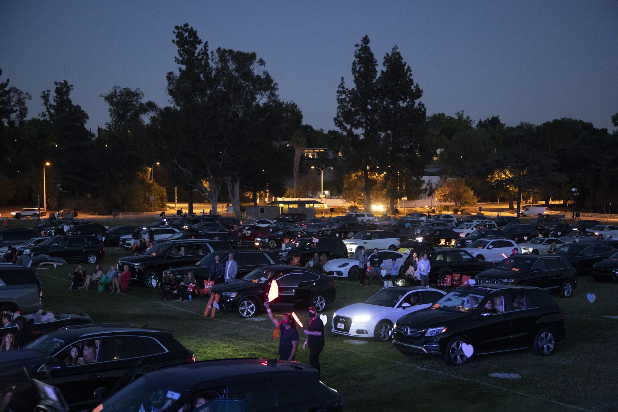 Rows of cars and their occupants at the Race to Erase MS drive-in concert at the Rose Bowl.