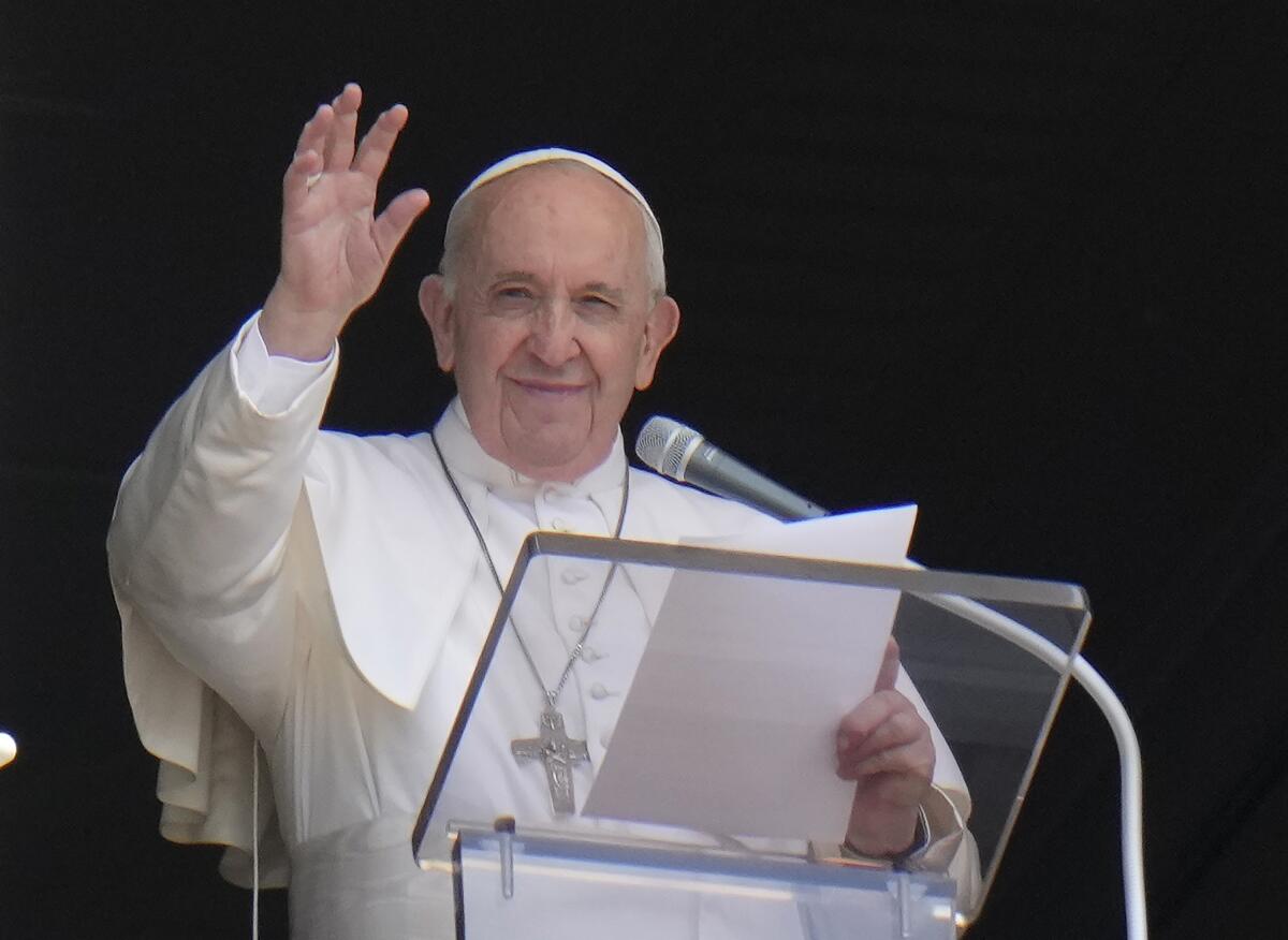 FILE - In this Sunday, July 4, 2021 file photo, Pope Francis waves to the crowd 