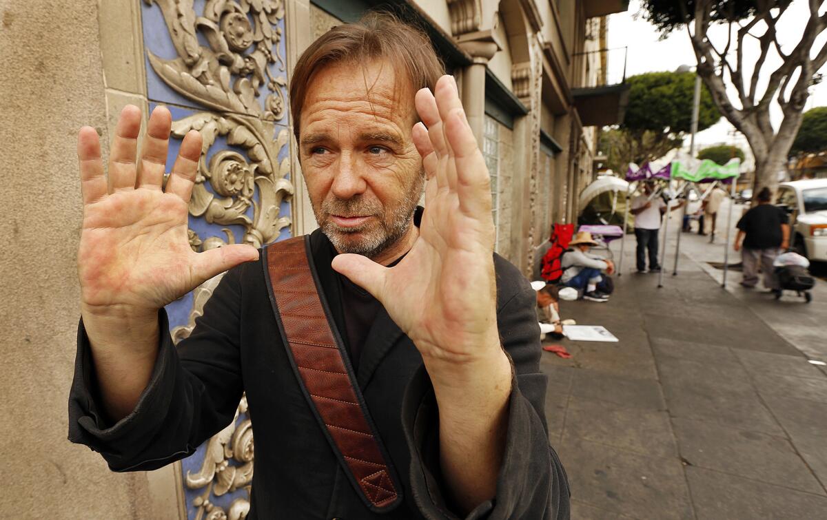 Sam Slovick a writer, musician, activist, actor and one-time heroin addict, shot 3,000 hours of video and lived in a tent on skid row while making a documentary about the 2011 Occupy Los Angeles movement.