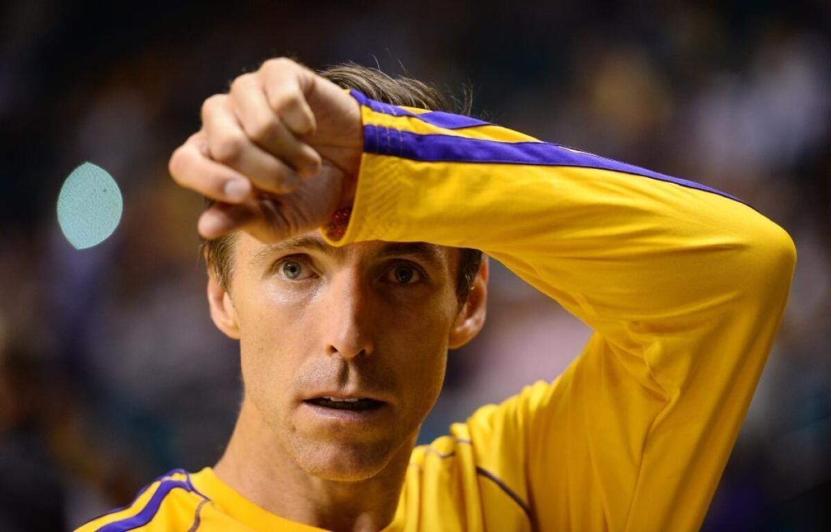 Steve Nash warms up before a preseason game against the Sacramento Kings on Oct. 10.