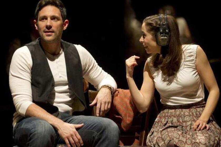 Steve Kazee and Cristin Milioti in a scene from the Broadway production of the musical "Once," based on the 2006 movie.
