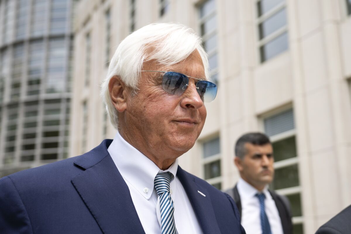 Bob Baffert, shown leaving a courthouse in New York in July, will saddle three horses in Friday's Breeders' Cup Juvenile.