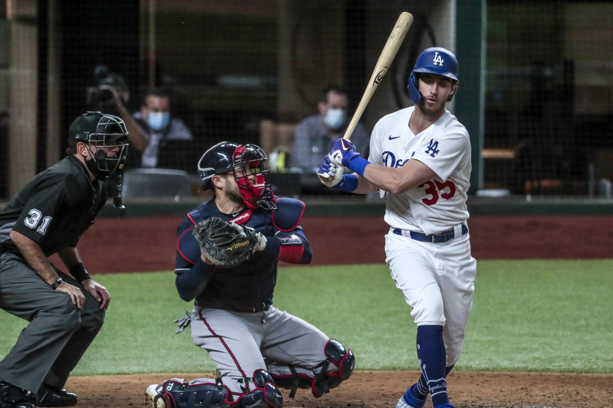 Dodgers center fielder Cody Bellinger strikes out during the fourth inning against the Atlanta Braves.