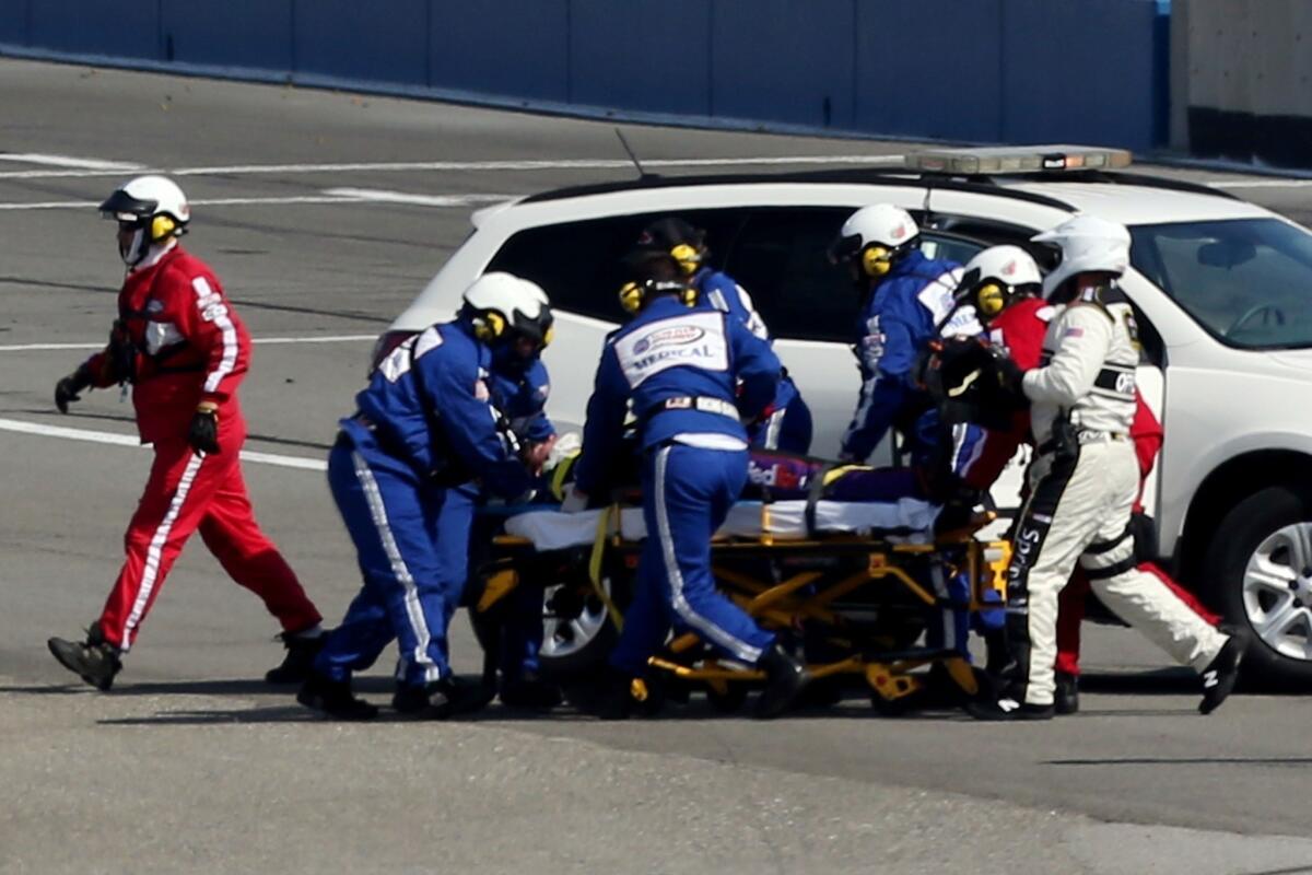 Denny Hamlin, seen on a stretcher following his crash Sunday at Auto Club Speedway, hoped to be released from a hospital Monday.