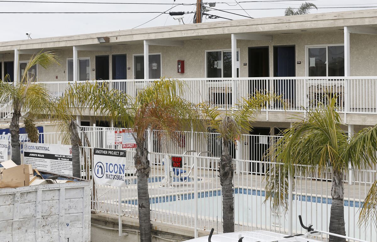 Rooms at the site of an old Motel 6 in Costa Mesa will become affordable apartments through the state's Project Homekey.