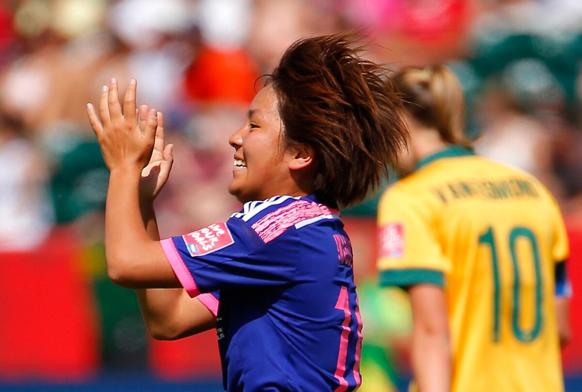Japan forward Mana Iwabuchi celebrates after scoring against Australia in a Women's World Cup quarterfinal game on Saturday.