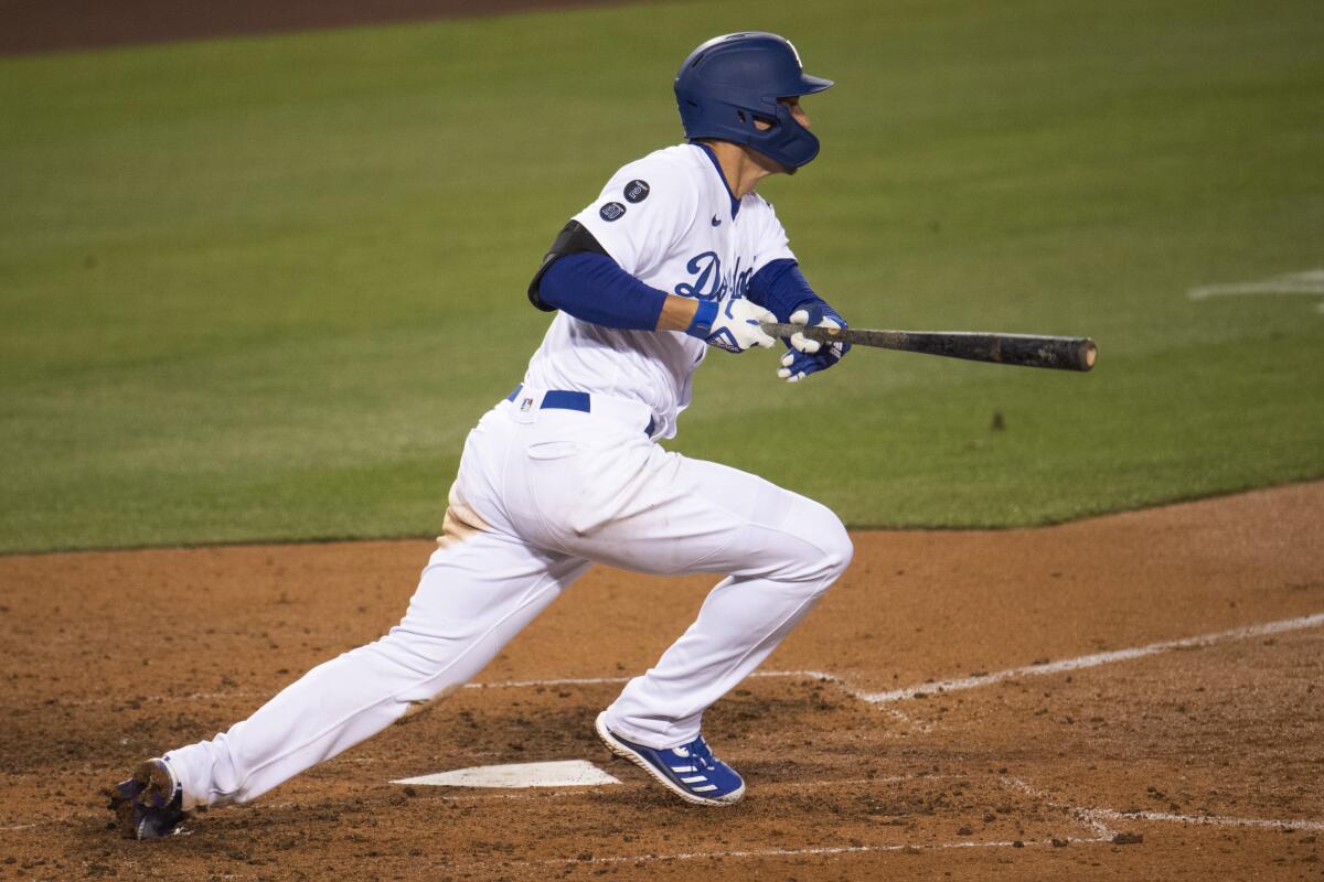 Corey Seager hits a two-run single during the sixth inning.