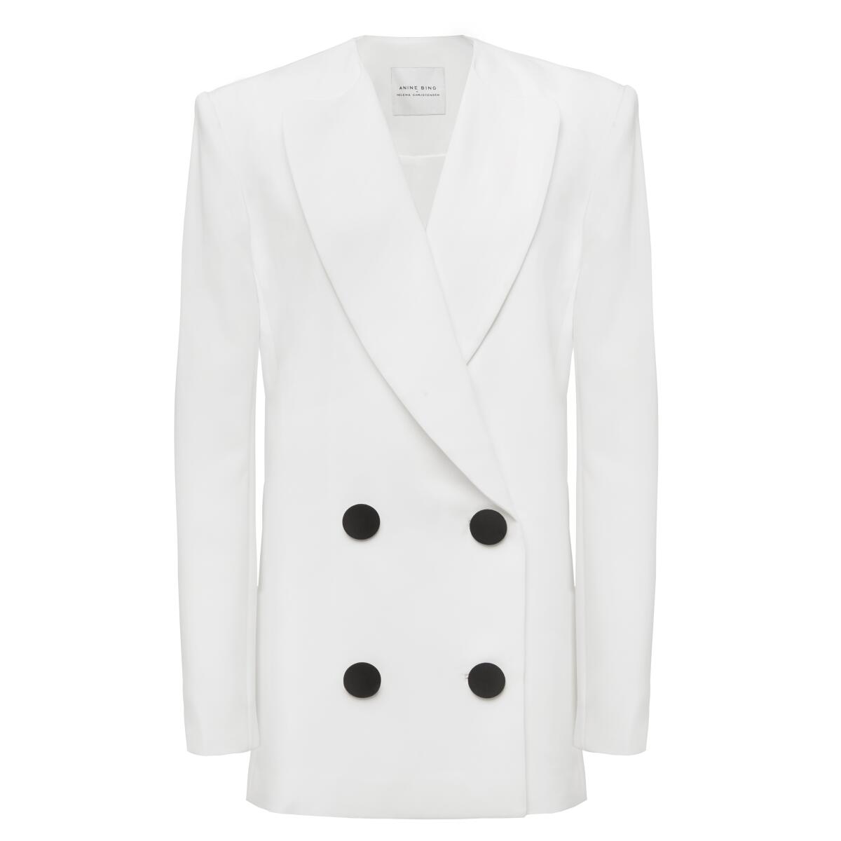  Anine Bing X Helena Christensen's limited-edition white Claudia blazer with large black buttons.