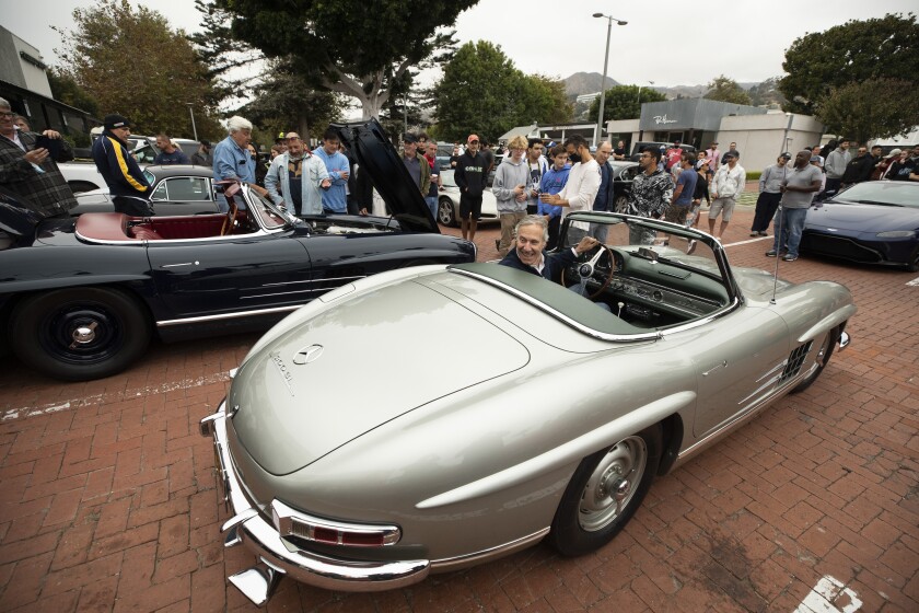 Bruce Meyers, a retail and real estate magnate, parks his 1957 Mercedes-Benz 300 SL Roadster during a gathering in Malibu.