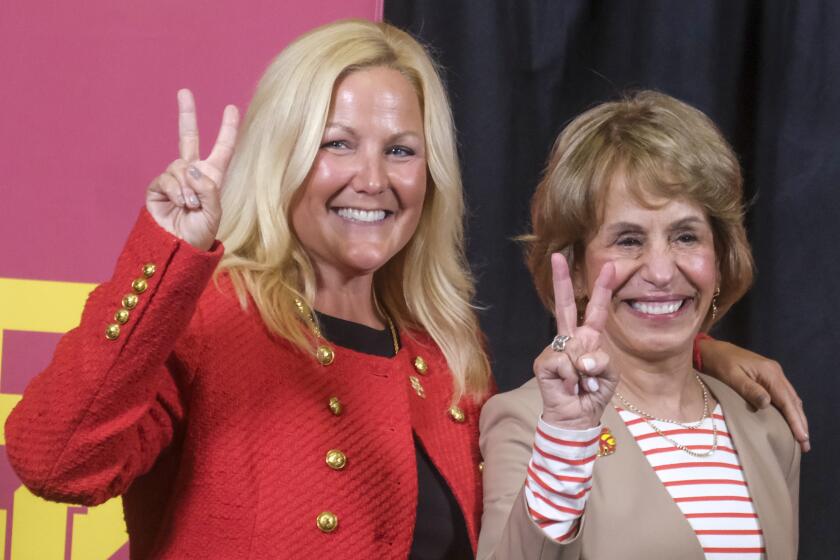 The Trojans' new athletic director Jennifer Cohen, left, and USC president Carol Folt.