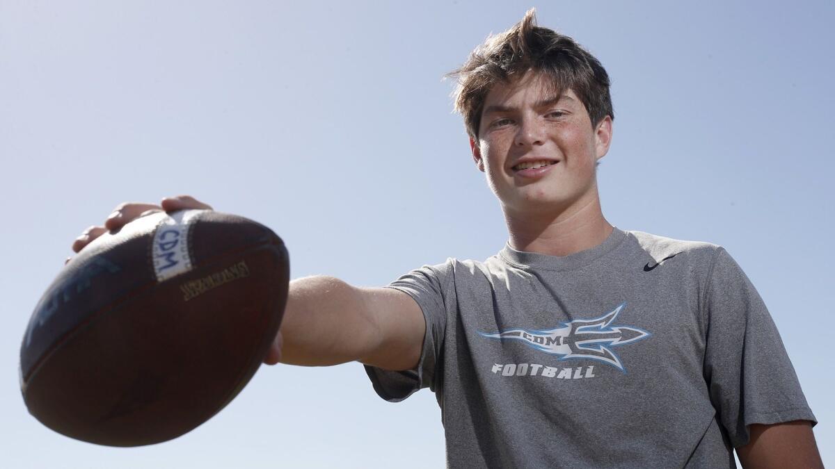 Ethan Garbers passed for 476 yards and six touchdowns, both Corona del Mar High single-game records, in the Sea Kings' 49-21 win over Fountain Valley at Newport Harbor High on Oct. 5.