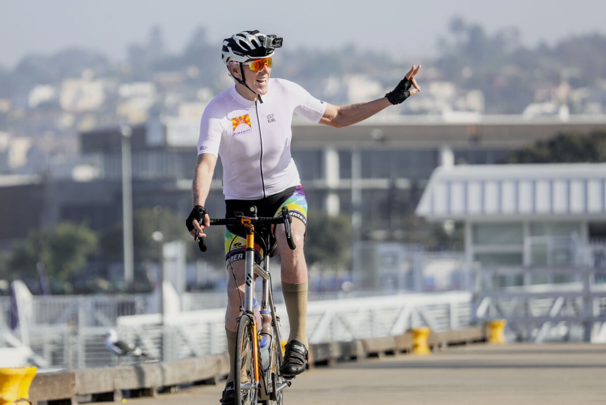Former NBA star Bill Walton rides his bike during the Bike for Humanity event April 25.