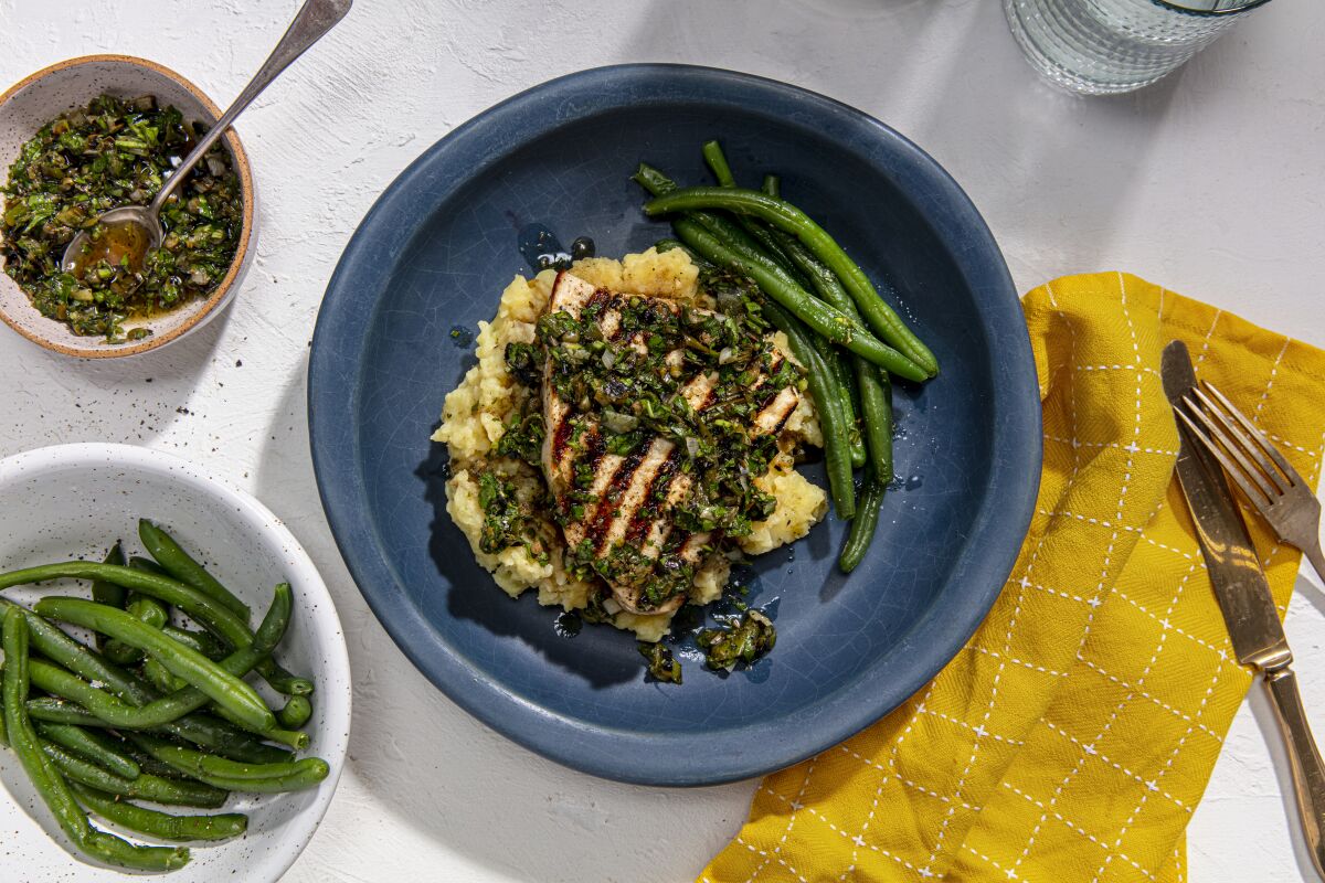 Grilled Swordfish with Quick Crushed Potatoes and Parsley-Caper Relish, served with green beans