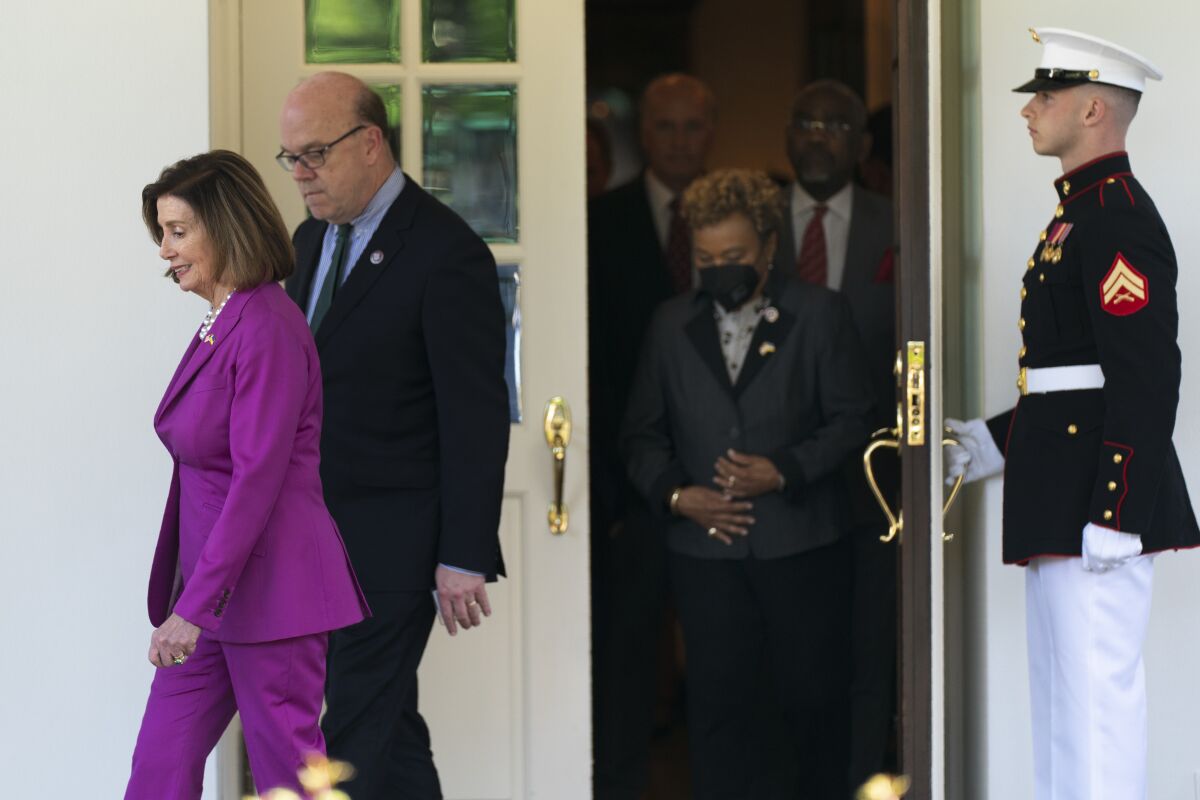 House Speaker Nancy Pelosi of Calif., followed by Rep. James McGovern, D-Mass., Rep. Barbara Lee, D-Calif., and other members of the Congressional delegation that recently visited Ukraine, walk out of the West Wing of the White House to speak to reporters following a meeting with President Joe Biden, Tuesday, May 10, 2022, in Washington. (AP Photo/Manuel Balce Ceneta)
